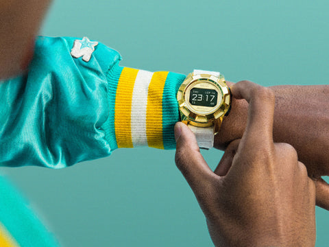 AAASY White Gold on wrist with turquoise background